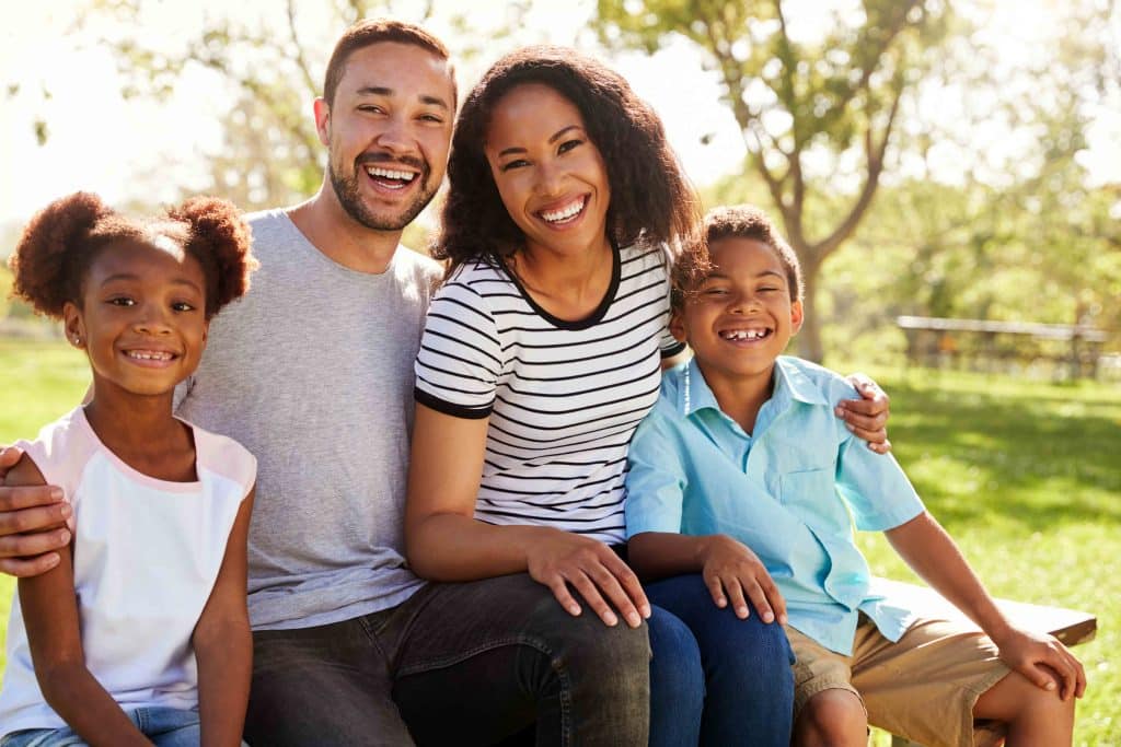 a smiling black family
